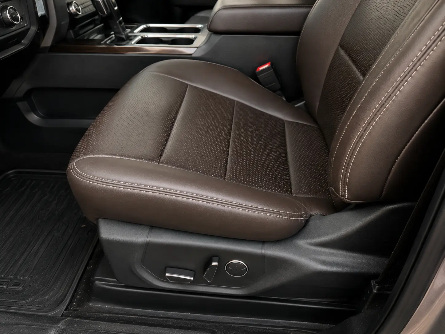 After SUV leather seat bolster repair