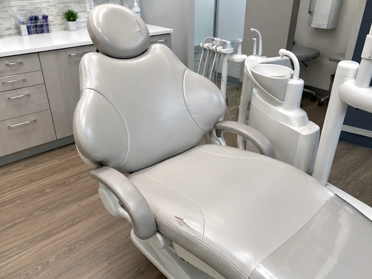 Before dental chair upholstery replacement