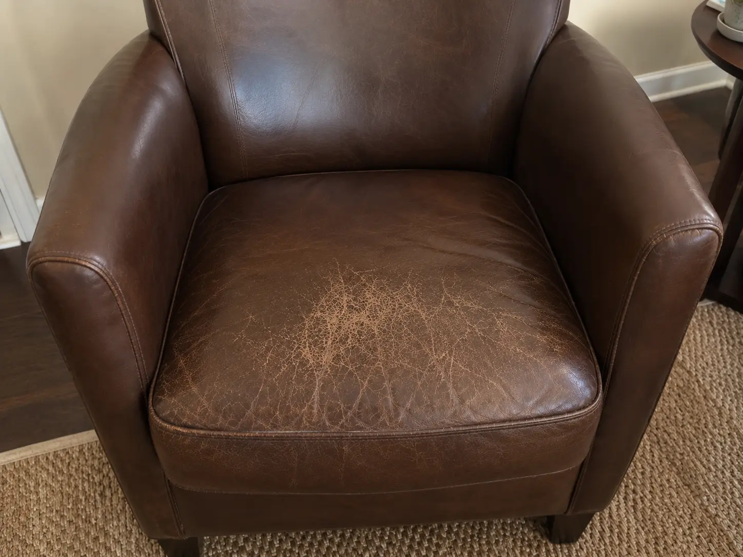 Before leather chair seat repair